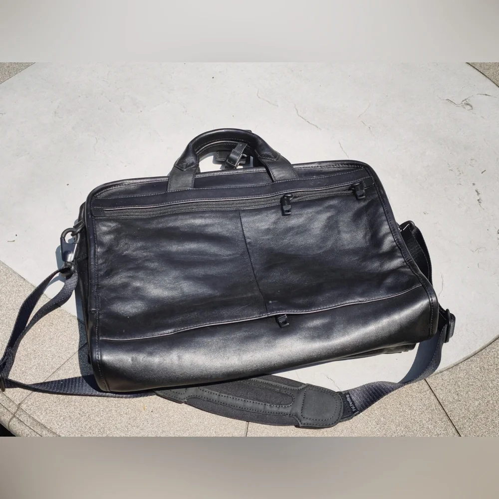 Tumi leather messenger bag